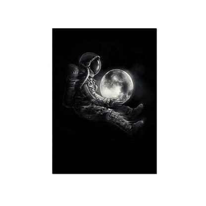 Astronaut Holding Moon Canvas Art