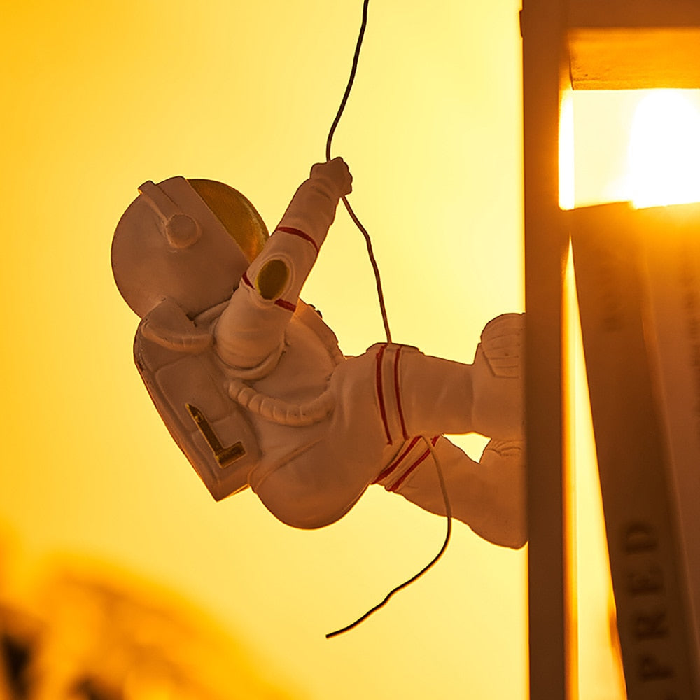 Climbing Astronaut Wall Statue