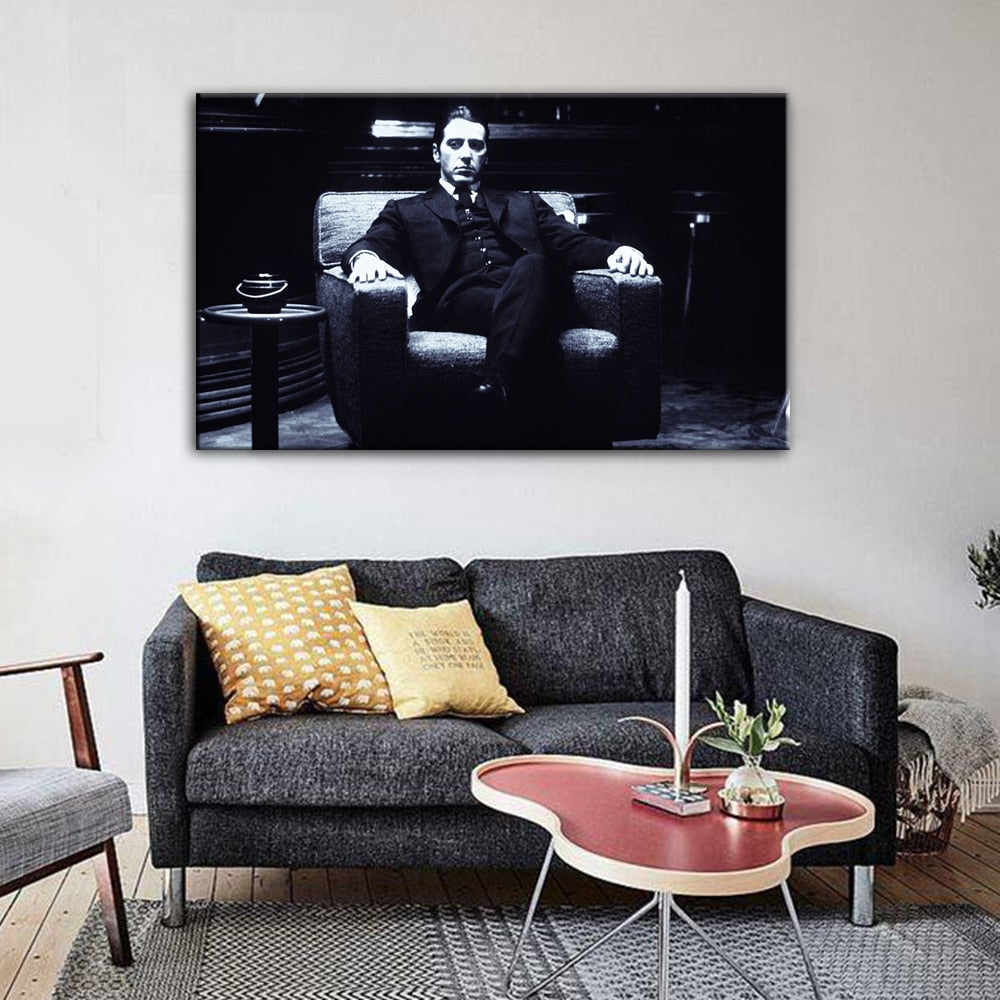 Black and White Man on Couch Canvas Art