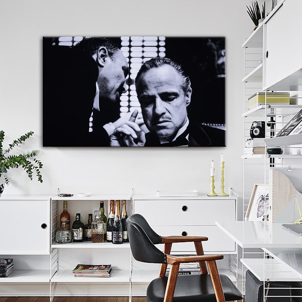 Black and White Man on Couch Canvas Art