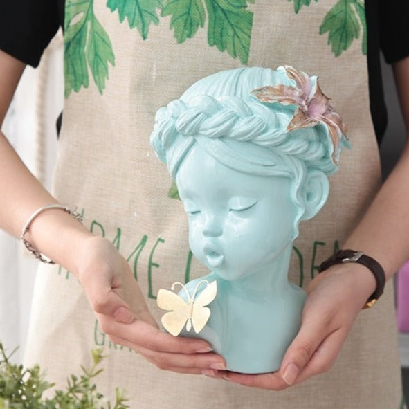 Cute Girl Kissing Butterfly Statue